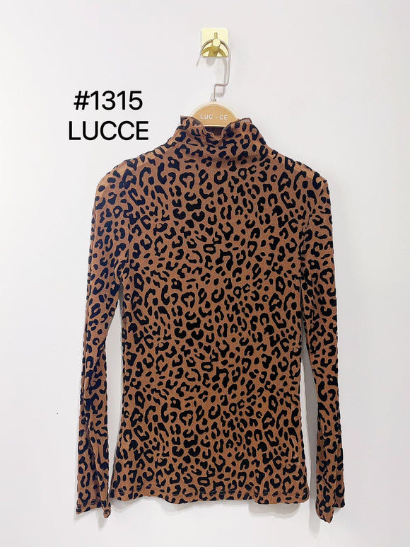 🤎 haut résille léopard marron – l’indomptable élégant