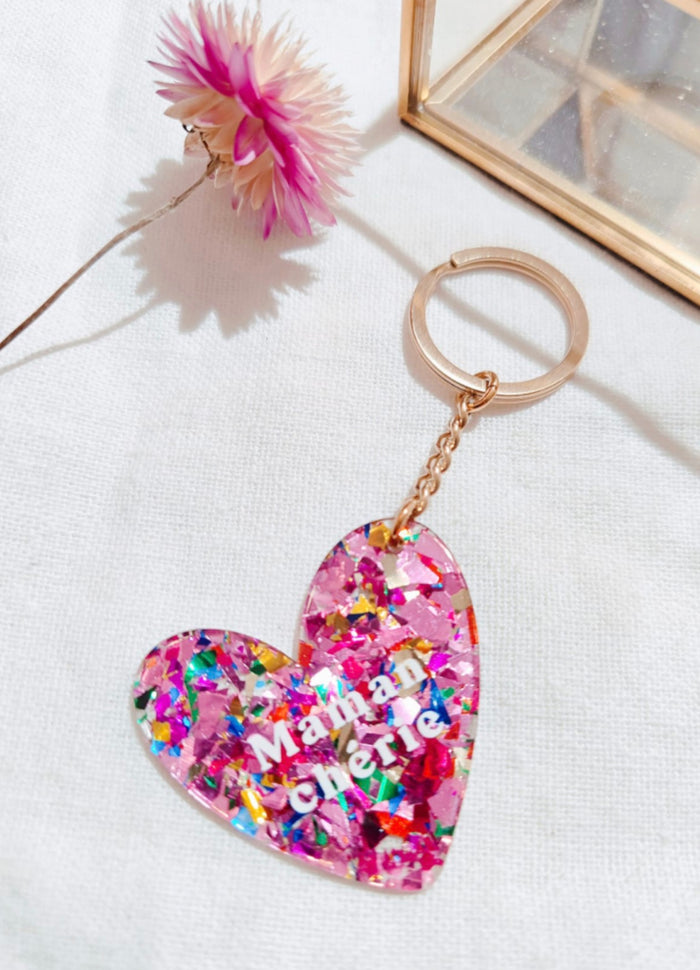 Porte clef résine paillette "MAMAN CHERIE" fuchsia