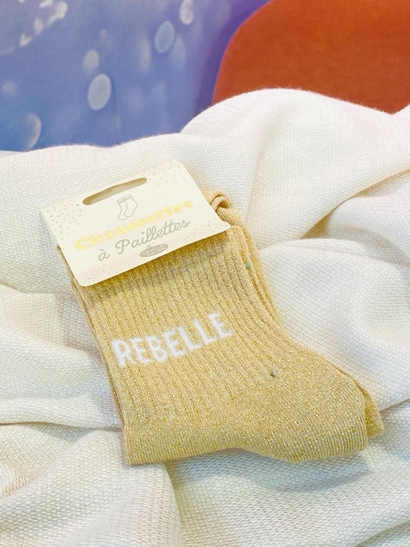  Chaussettes dorées pailletées avec l’inscription 