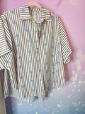 chemise rayée marron et broderies florales bleues