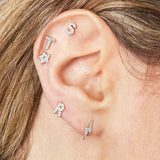 Piercing d'oreille étoile