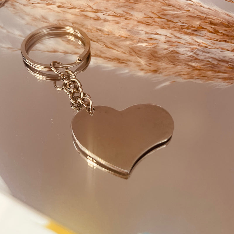 Porte clé coeur acier . Personnalisable