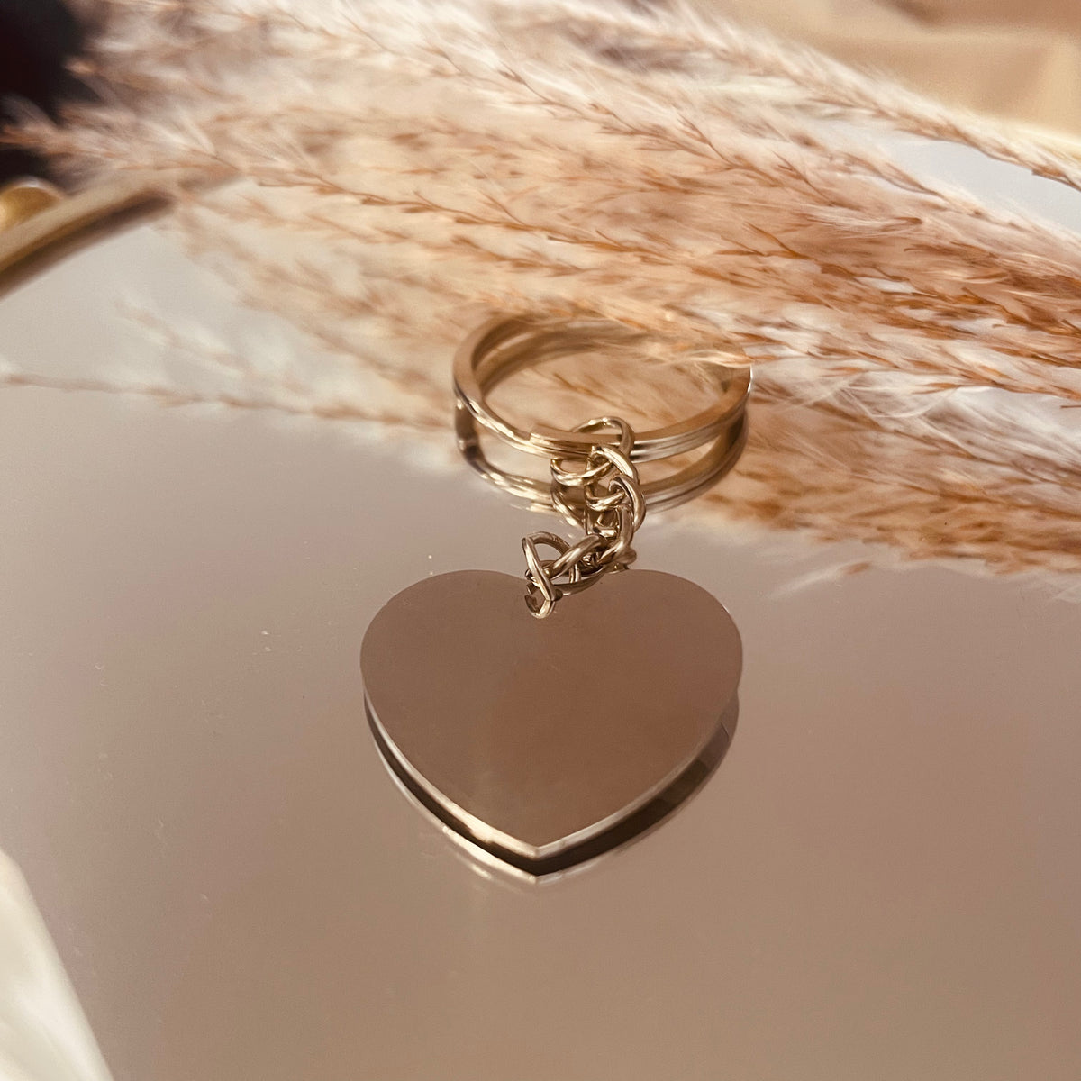 Porte clé coeur acier . Personnalisable